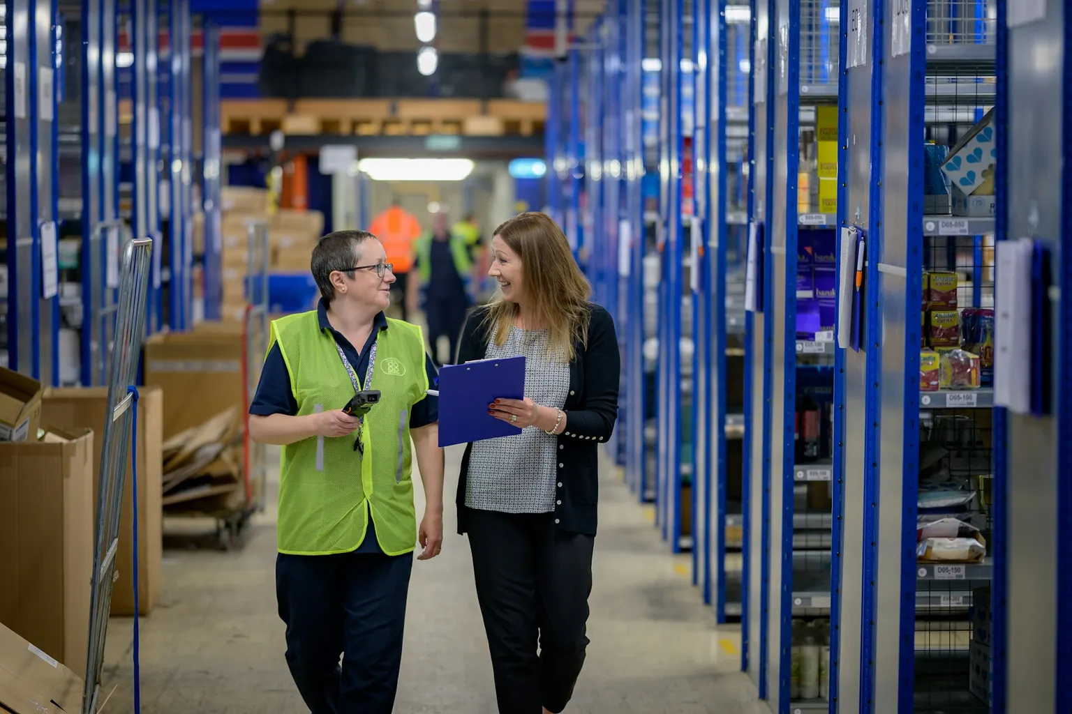 Warehouse worker scanning package